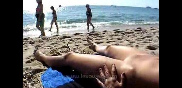  Woman walks naked around beach